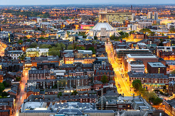 Liverpool skyline and Metropolitan cathedral Aerial view of Liverpool city and the Metropolitan Cathedral. liverpool england stock pictures, royalty-free photos & images