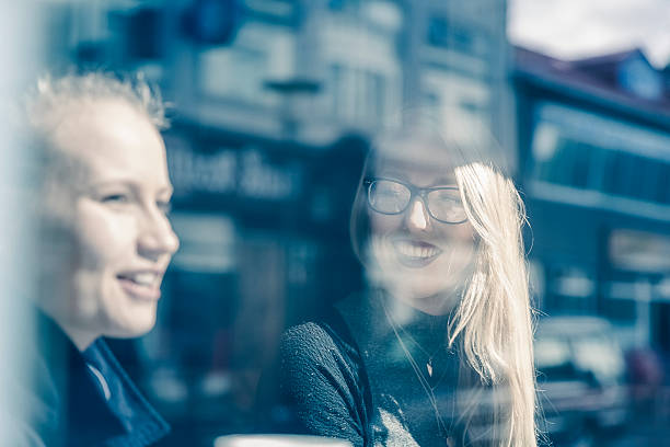 istock Female professionals seen through cafe window 479427308