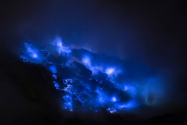 Blue sulfur flames, Kawah Ijen volcano, East Java stock photo