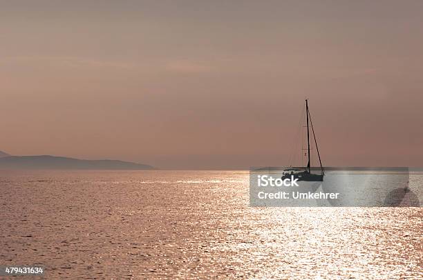 Sailboat On Sunset Stock Photo - Download Image Now - 2015, Atmospheric Mood, Backgrounds