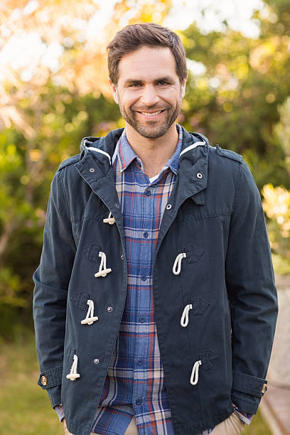 istock Handsome man smiling in his garden 479431796