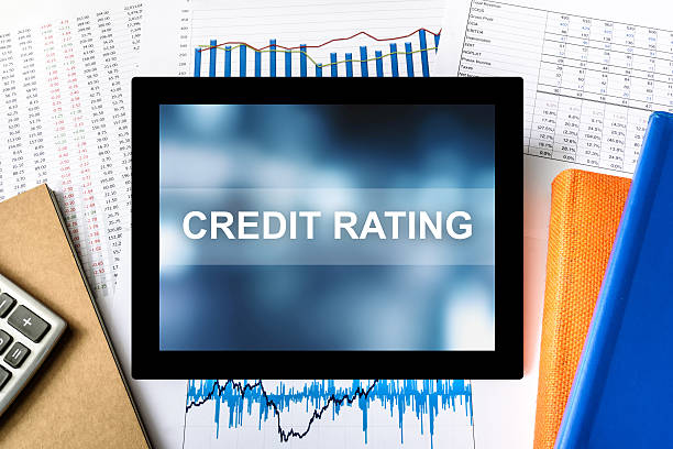 credit rating word on tablet stock photo
