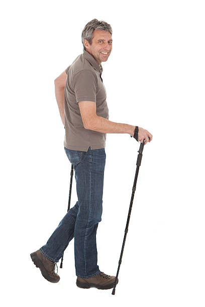 istock Senior man with hiking poles 479435506