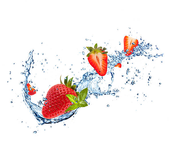 istock Fresh strawberries in water splash on white 479435674