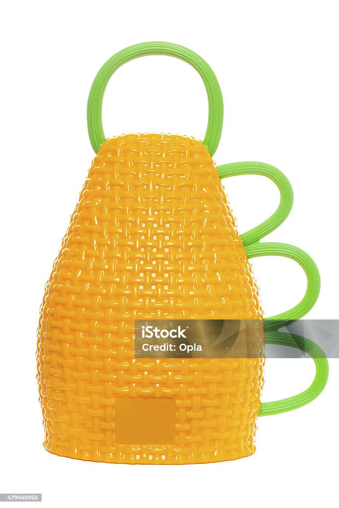 Caxirola back Yellow caxirola isolated. The caxirola is the official musical instrument of the 2014 FIFA World Cup in Brazil. 2014 Stock Photo