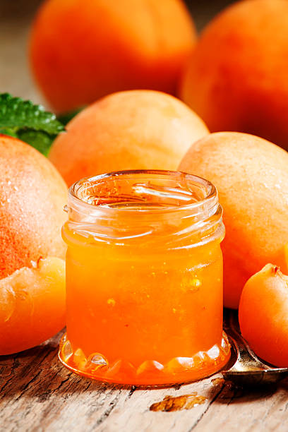 istock Homemade apricot jam and fresh apricots 479443628