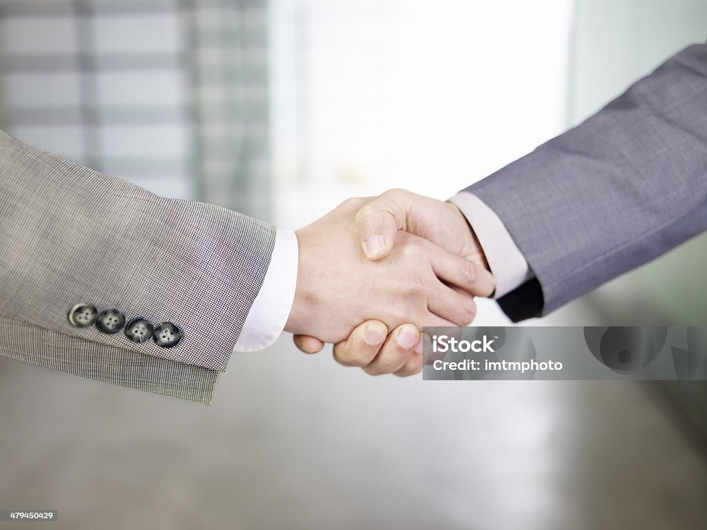 handshake businesspeople shaking hands. Adult Stock Photo