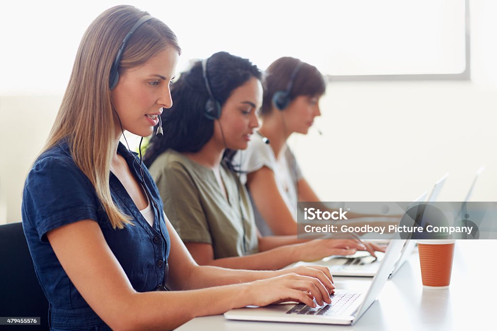 Thank you for calling Shot of a team of young support agents working in an officehttp://195.154.178.81/DATA/i_collage/pu/shoots/804837.jpg 2015 Stock Photo