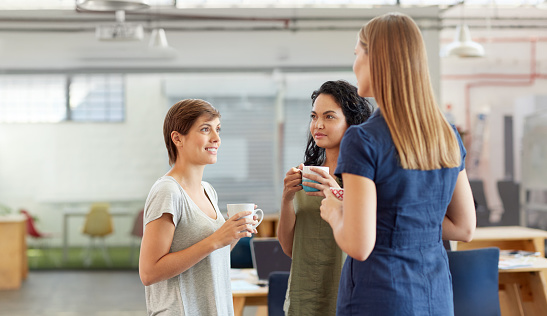 Shot of young women having a conversation during a coffee break in an officehttp://195.154.178.81/DATA/i_collage/pu/shoots/804837.jpg