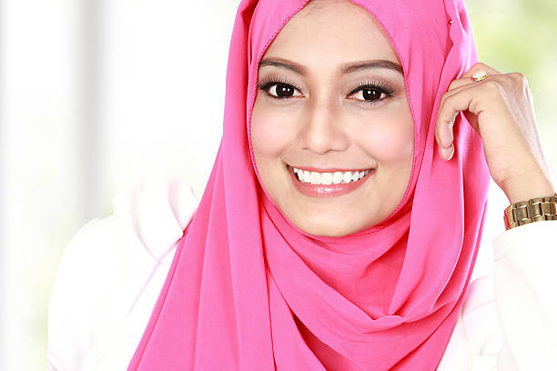 istock young attractive woman wearing scarf 479462842