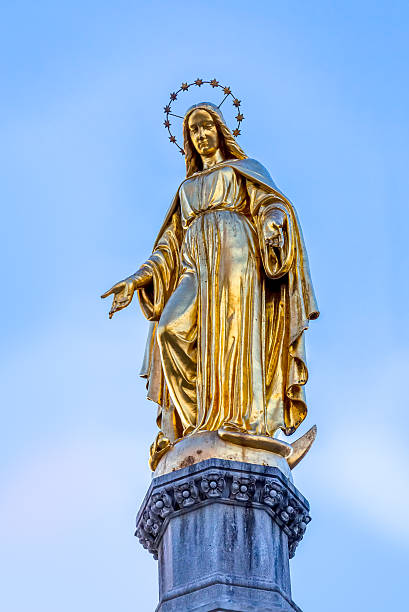 istock Virgin Mary golden statue 479463236