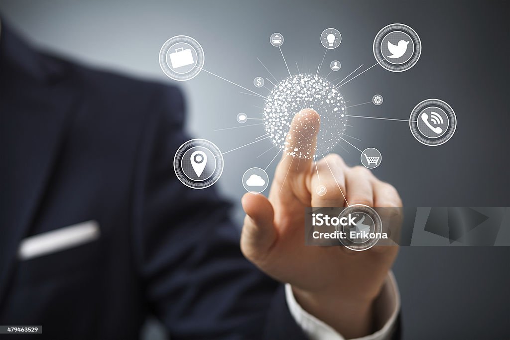 Businessman touching button Businessman touching button on visual screen Adult Stock Photo