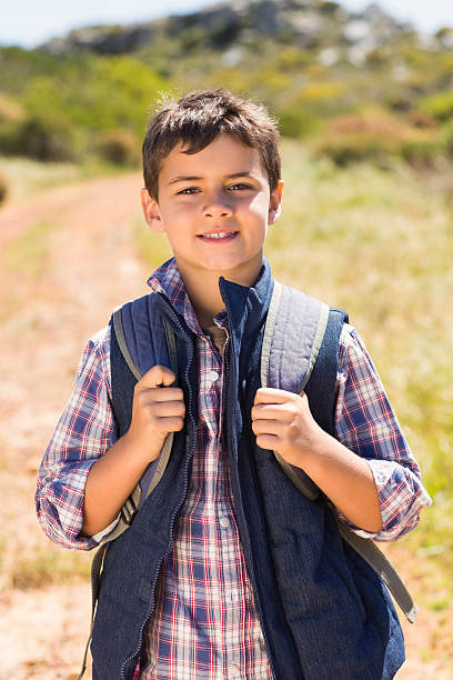 istock Little boy hiking in the mountains 479463556