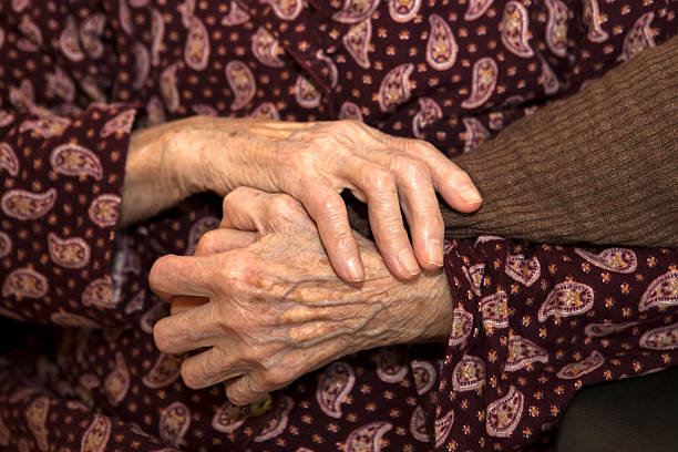 istock Senior woman's wrinkled hands. 479467097