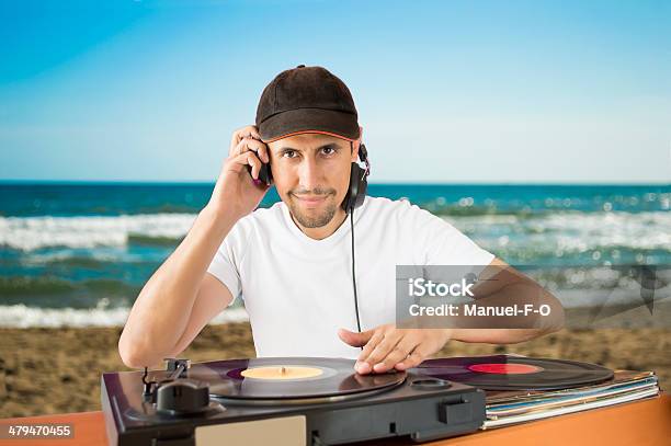 Dj Vinyl Record On A Turntable Stock Photo - Download Image Now - Beach, DJ, Adult