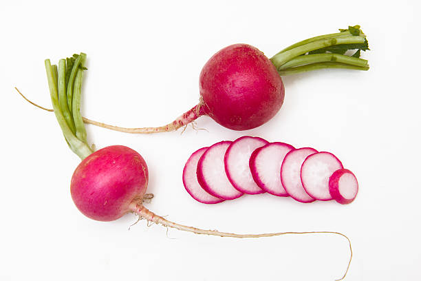 スライス radishes - radish isolated bunch vegetable ストックフォトと画像