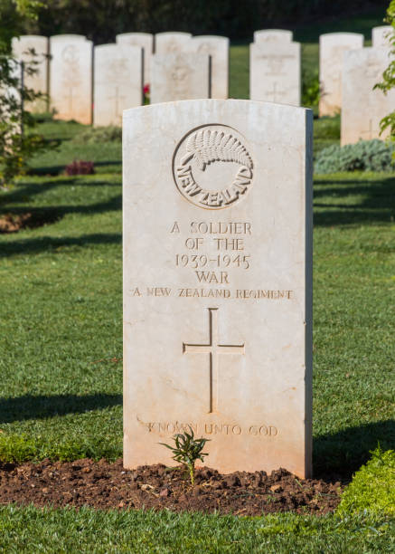 istock White headstones at war cemetery 479477859
