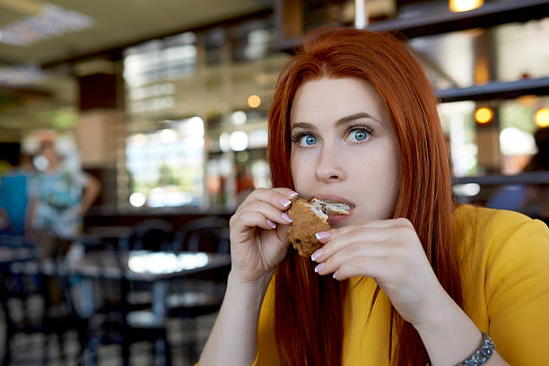 istock so hungry woman 479477900