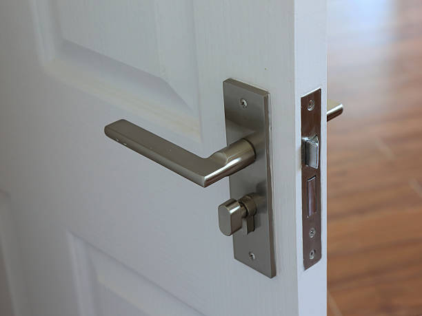 istock metallic knob on white door horizontal 479478538