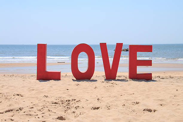istock word love on the beach 479478802