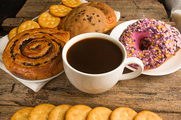 istock Cup of coffee on a wooden board and biscuits 479479084