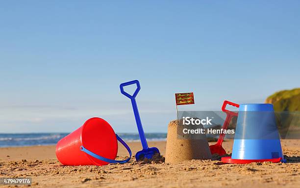 Beach Sea Buckets Spades And Welsh Flag Stock Photo - Download Image Now - The Lleyn Peninsula, 2015, Beach