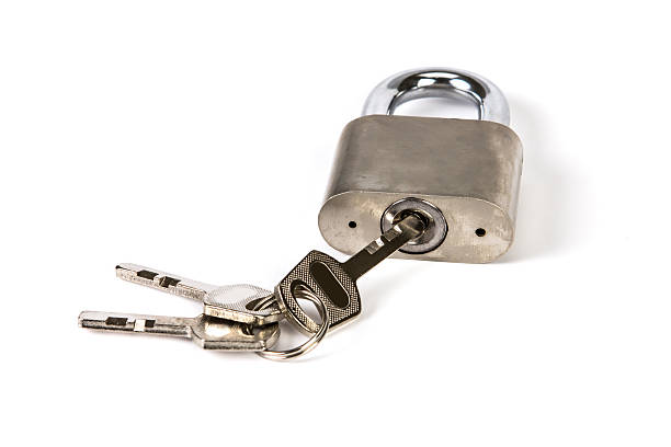 istock Mealic padlock with the key on white background 479481036