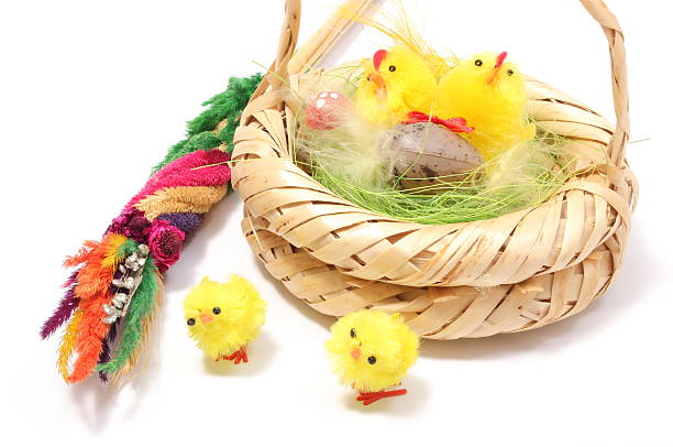 istock Easter chickens in wicker basket and colorful palm 479481063
