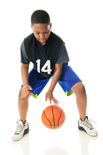 rapid fuoco dribblare - basketball child dribbling basketball player foto e immagini stock