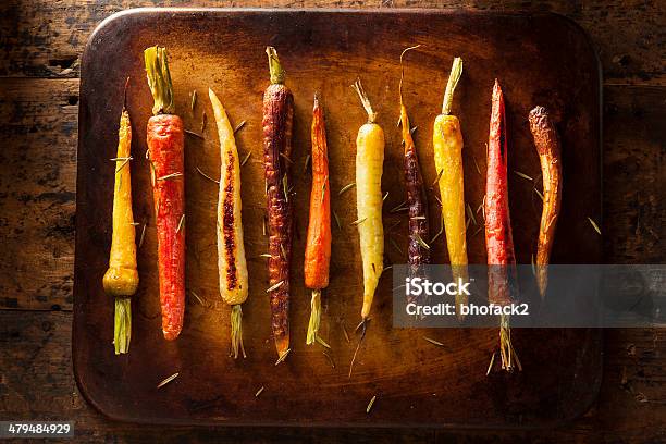 Colorful Multi Colored Roasted Carrots Stock Photo - Download Image Now - Bunch, Carrot, Colors