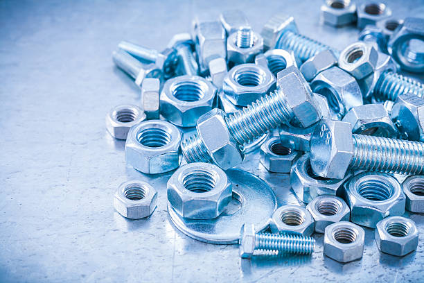 istock Big stack of metal threaded screwbolts nuts and bolt washers 479484996