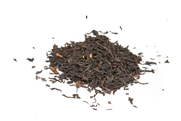 foglie di tè nero - lapsang souchong tea foto e immagini stock