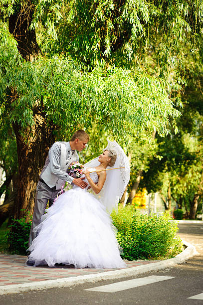 istock Groom and Bride in the park 479489131