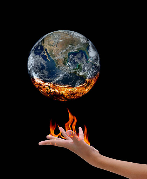 istock Fire on hand and earth , Elements  furnished by NASA 479492984