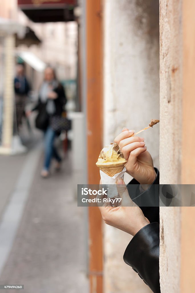 Eating Ice Cream Hiding and eating an ice cream 2015 Stock Photo