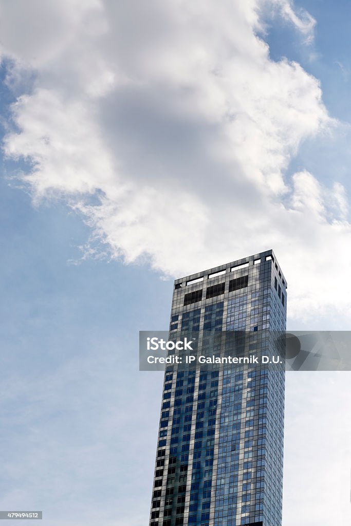 Skyscrapers from ground view with blue sky visible Corporate skyscrapers. Office buildings. Business district. Financial center. Architecture 2015 Stock Photo