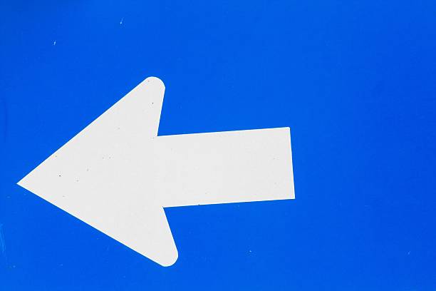 istock blue road sign with white arrow 479494920