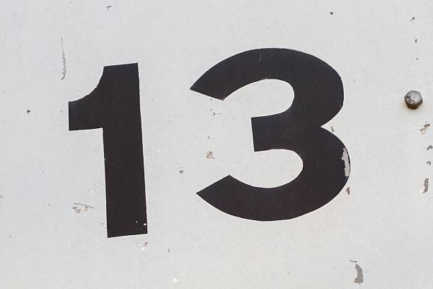 istock closeup black number 13 from traffic road sign 479494924