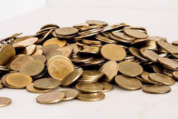 istock Stack of golden Thai coins isolated on white background 479495298