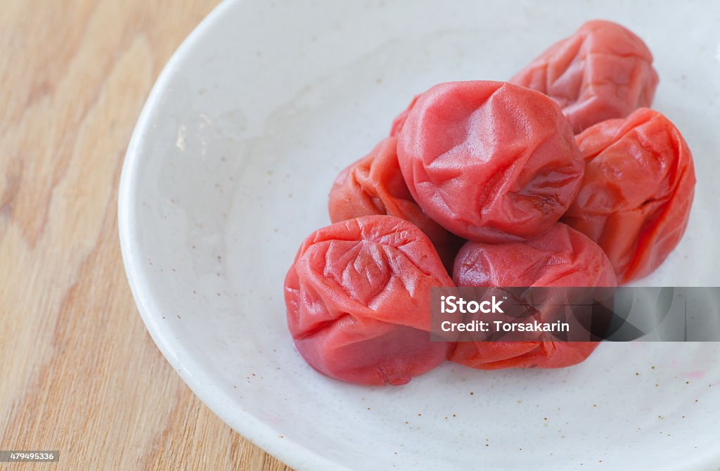 salt plums or pickled plums Umeboshi , Japanese traditonal food salt plums or pickled plums Umeboshi Stock Photo