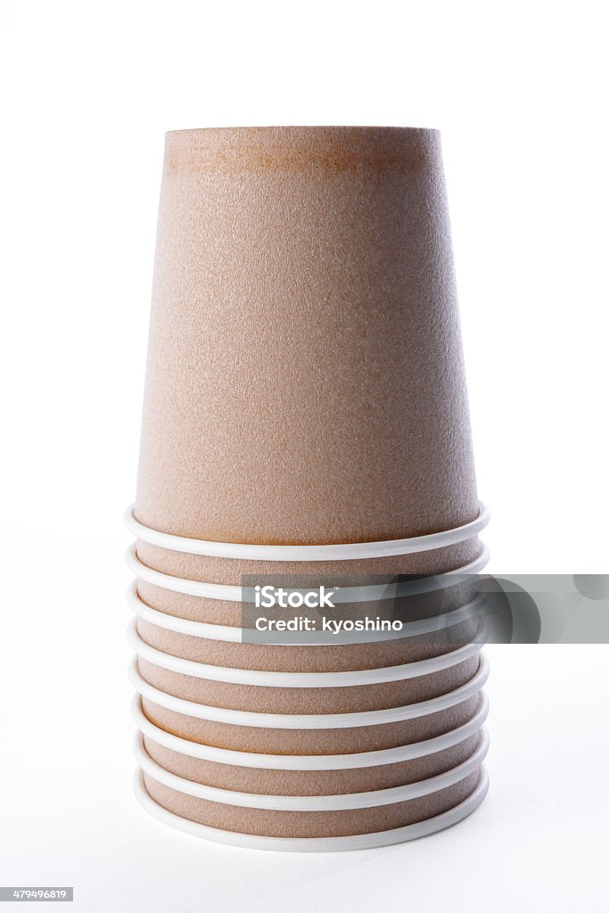 Isolated shot of stacked brown disposable cups on white background Stacked brown disposable cups isolated on white background with clipping path. Blank Stock Photo