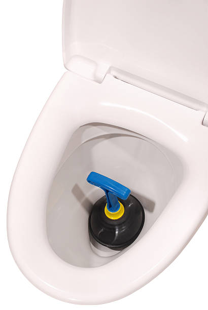 istock White toilet bowl and plunger (Clipping path) 479497013