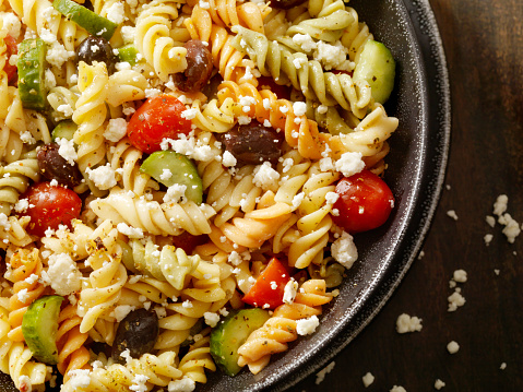 Greek Pasta Salad With Fusilli, Tomatoes,Cucumbers, Black Olives and Feta in an Oil and Vinegar Dressing,  -Photographed on Hasselblad H3D2-39mb Camera