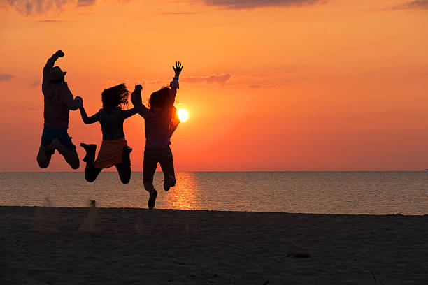 istock Group of People Celebrating on the beach 479498600