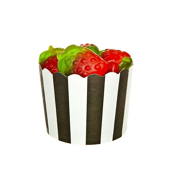 Strawberry flavour Jelly candies and a black and white paper cup