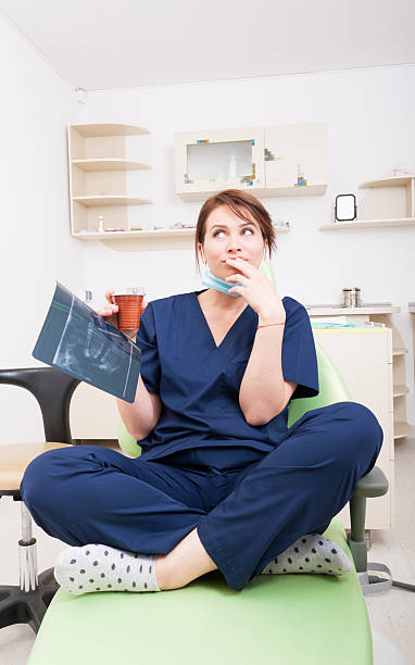 istock Dentist woman thinking in her coffee break 479501468