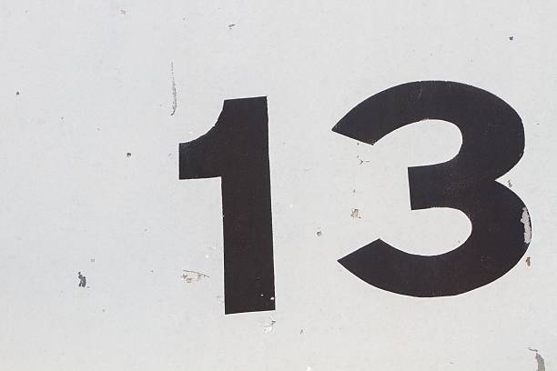 istock closeup black number 13 from traffic road sign 479501830