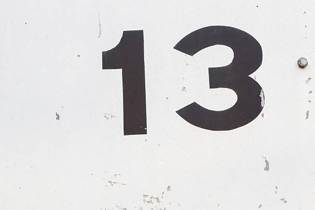 istock closeup black number 13 from traffic road sign 479501836