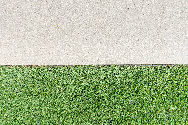 istock Gravel texture and strip grass as background 479501918
