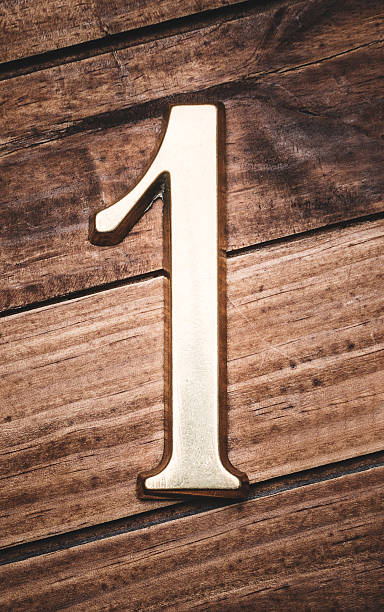 istock golden number one on plank background 479502001